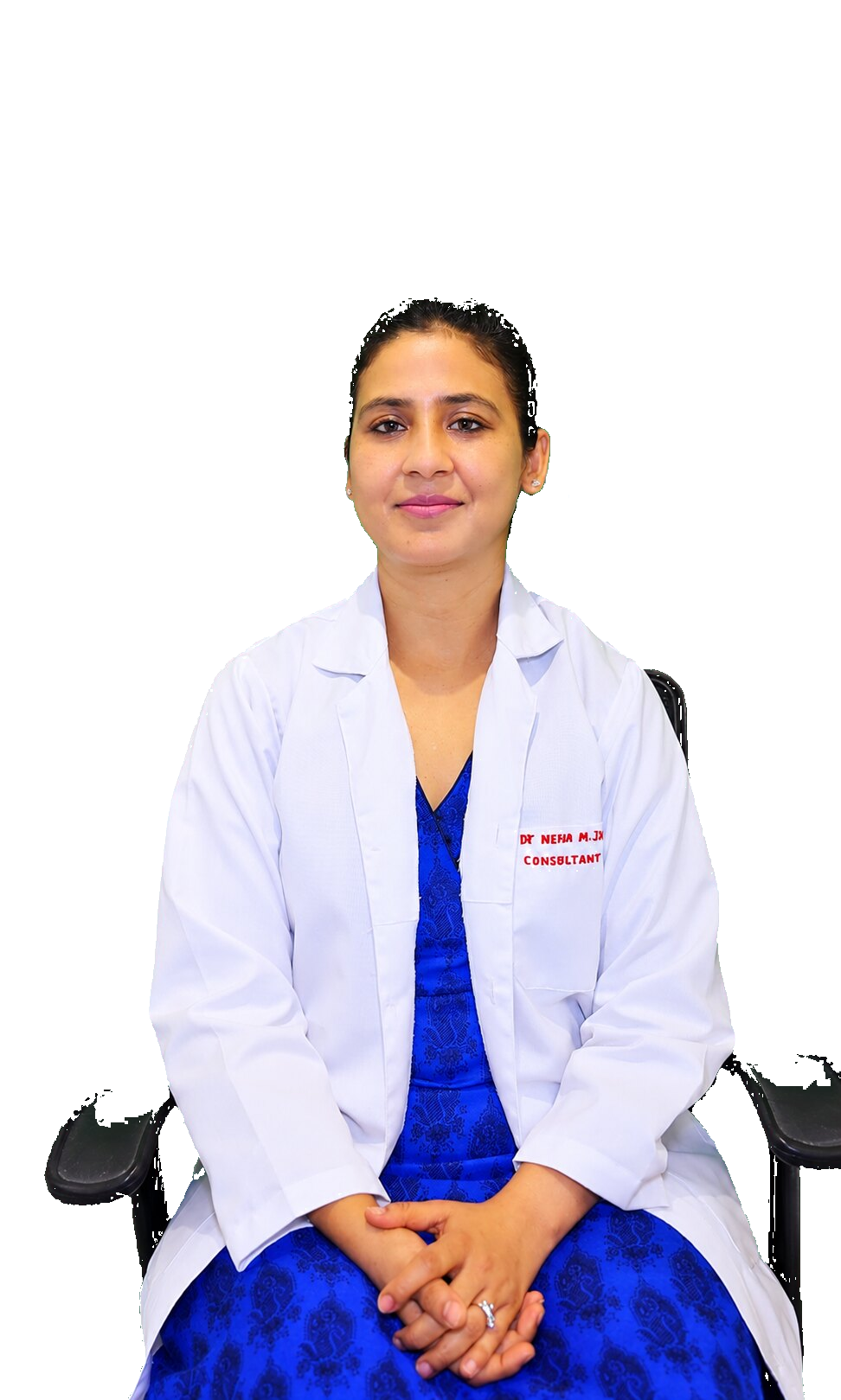 Dr. Neha Mohan in her clinical coat at Jain Eye Hospital